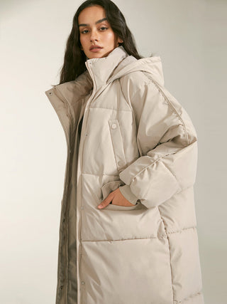 Manteau long matelassé à capuche