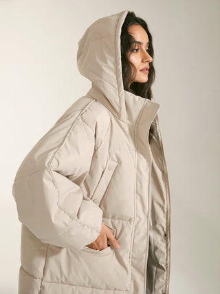 Manteau long matelassé à capuche