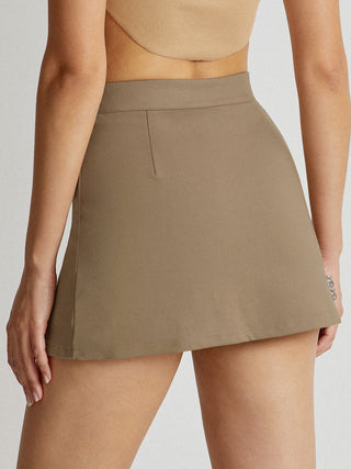 Jupe mini taille haute à ligne en V avec doublure short