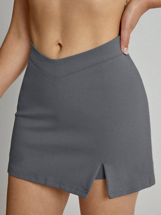 Jupe mini taille haute à ligne en V avec doublure short