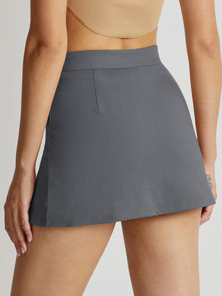 Jupe mini taille haute à ligne en V avec doublure short