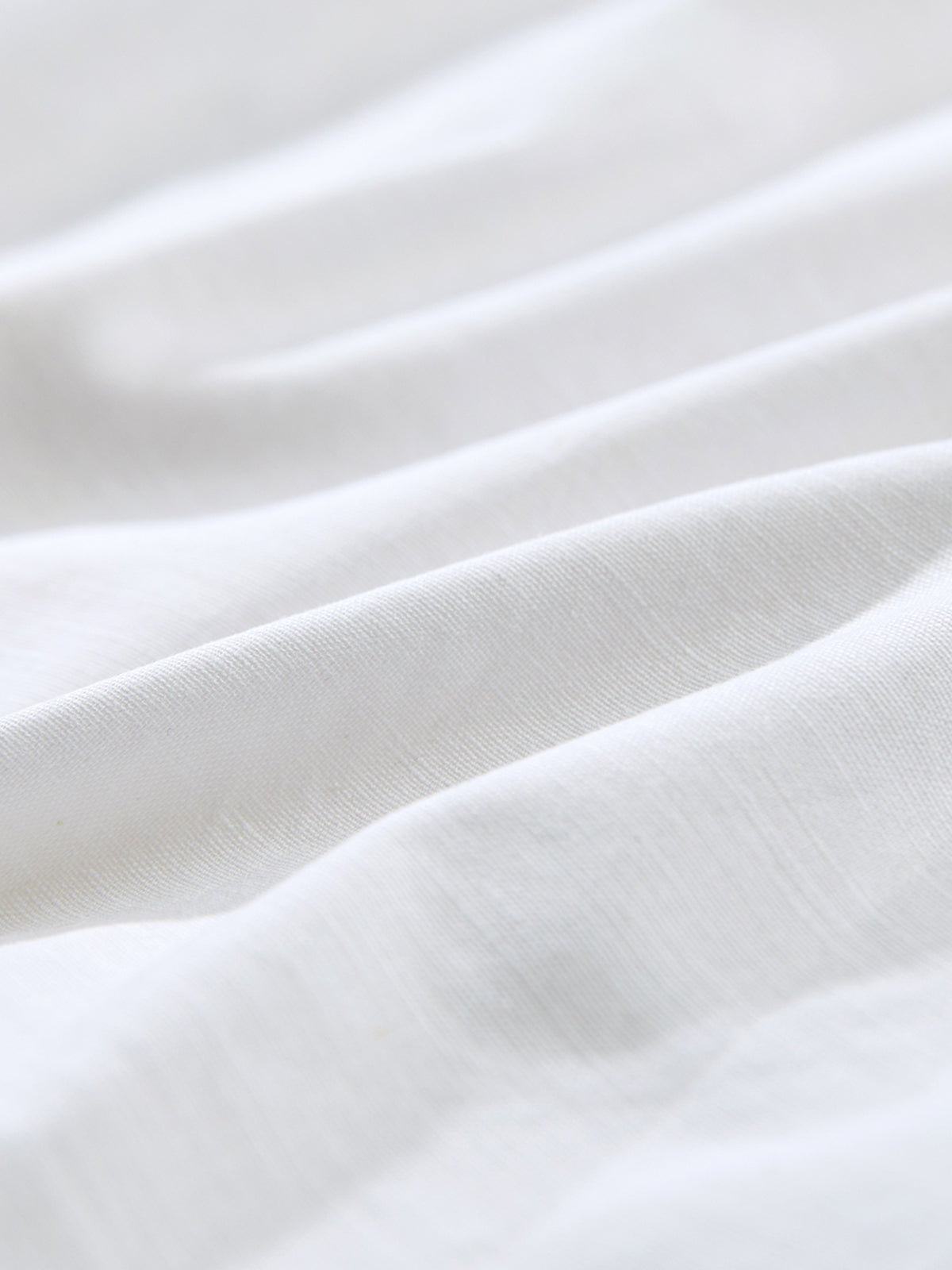 Chemise boutonnée en lin ample à épaules tombantes