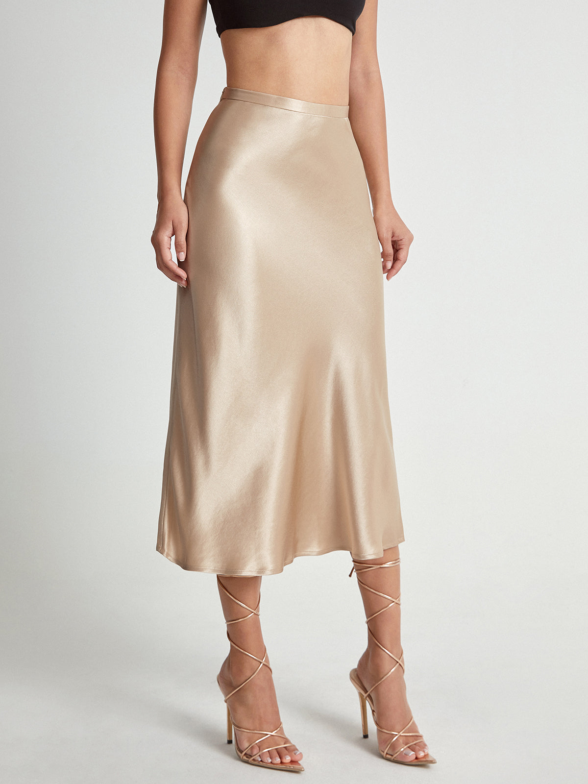 Jupe midi fluide en satin taille haute