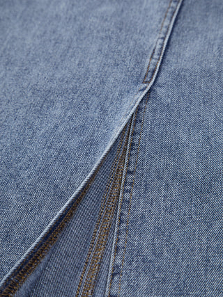 Jupe longue en denim fendue avec poches boutonnées asymétriques