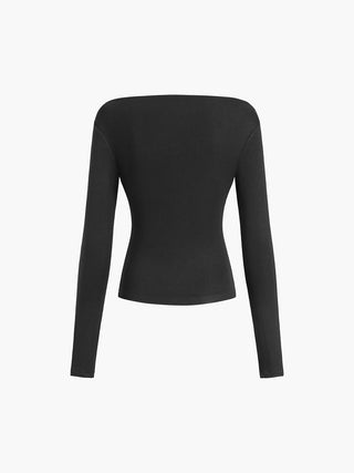 Blouse à manches longues à épaules dénudées obliques