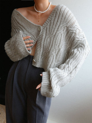 Cardigan court en tricot câblé