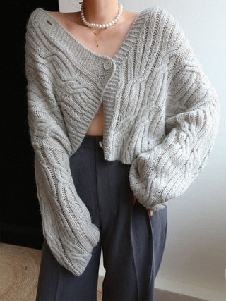 Cardigan court en tricot câblé