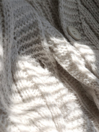 Cardigan court en tricot câblé