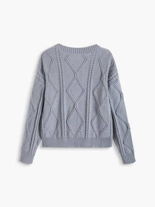 Pull en tricot câblé