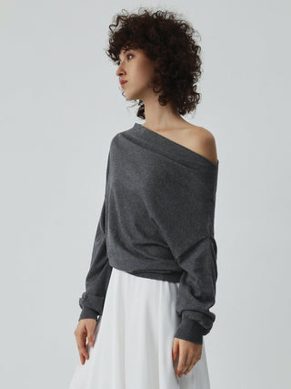 Pull asymétrique à épaule dénudée