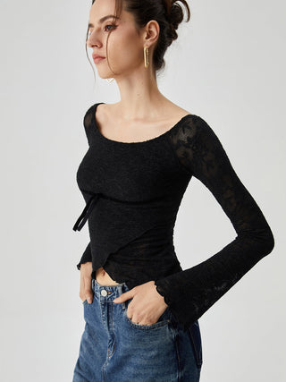 Blouse croisée semi-transparente en dentelle jacquard avec nœud