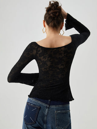 Blouse croisée semi-transparente en dentelle jacquard avec nœud