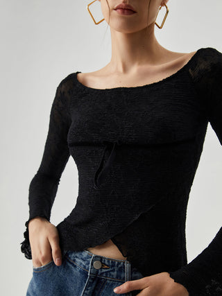 Blouse croisée semi-transparente en dentelle jacquard avec nœud