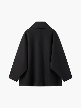 Manteau boutonné oversize à poches solides