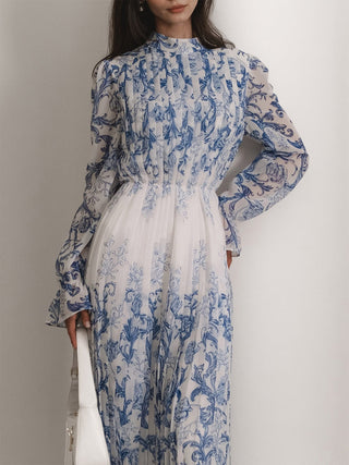 Robe longue plissée imprimée à motif végétal