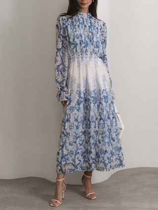 Robe longue plissée imprimée à motif végétal