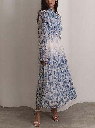 Robe longue plissée imprimée à motif végétal