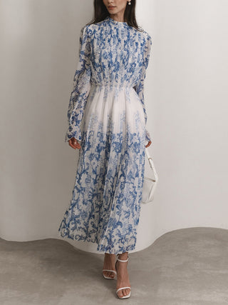 Robe longue plissée imprimée à motif végétal