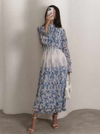 Robe longue plissée imprimée à motif végétal