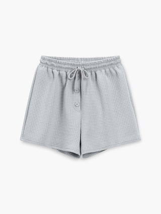 semble décontracté avec chemise à épaules tombantes et short