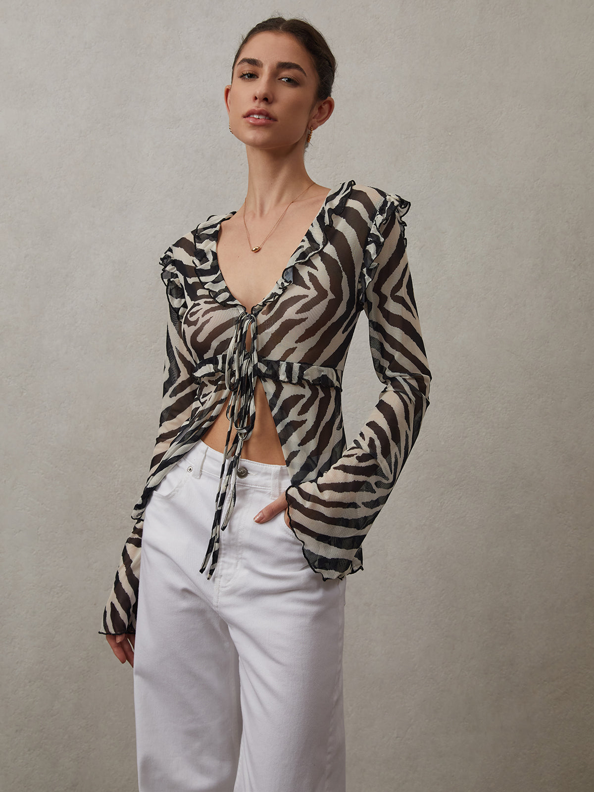 Haut noué à détail de volants en maille