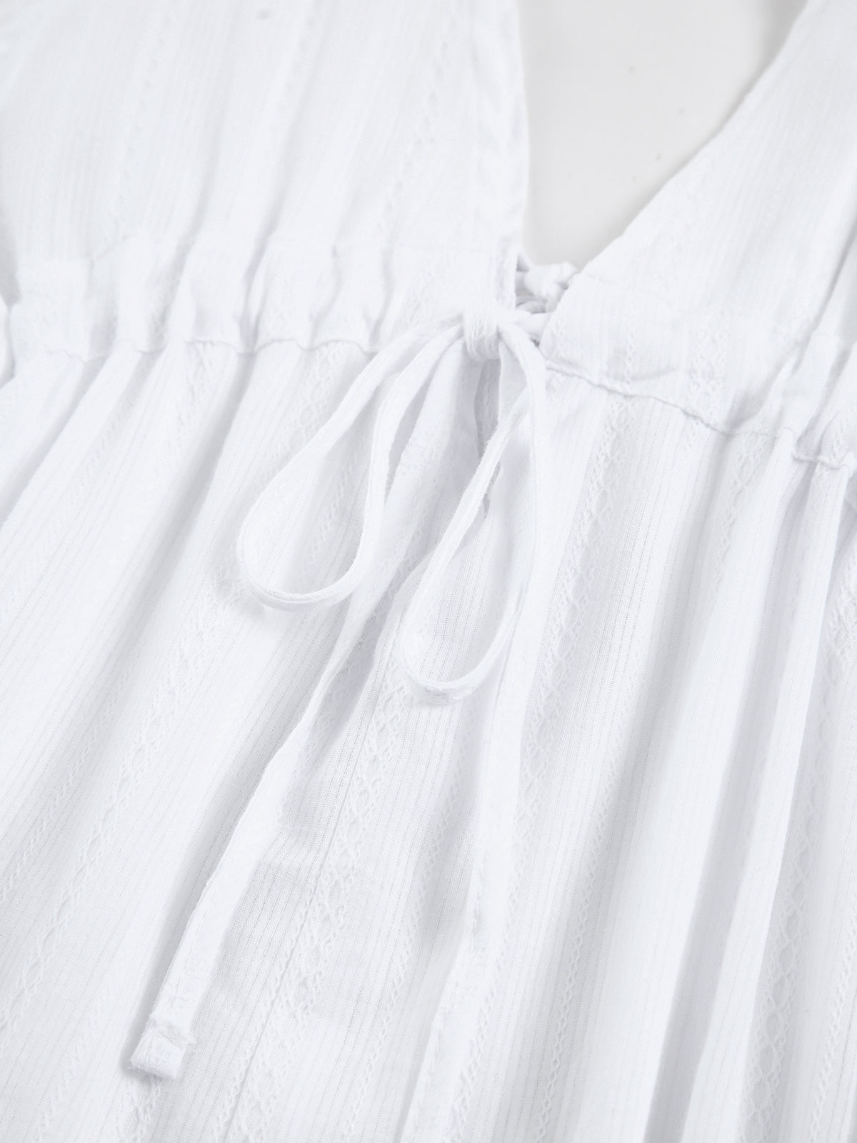 Robe courte dos ouvert en pur coton