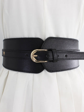 Large ceinture à boucle dorée