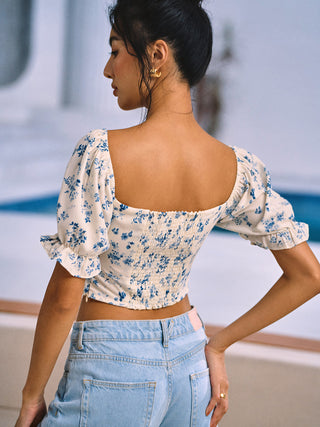 Blouse froncée à nœud imprimé floral