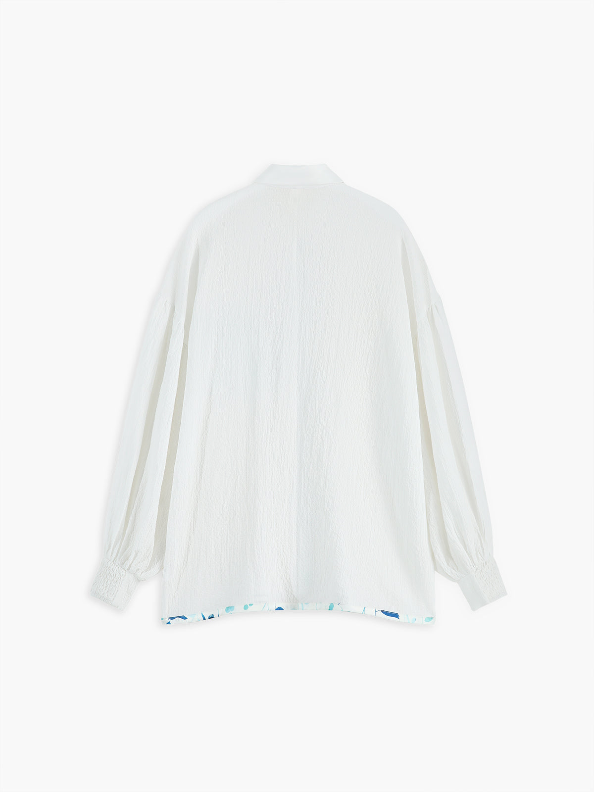 Chemise à manches évêque boutonnée à fleurs