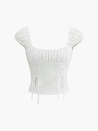 Blouse décorée de nœud à lacets