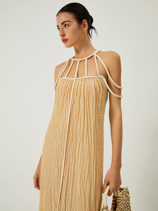 Robe longue dos nu à encolure halter drapée