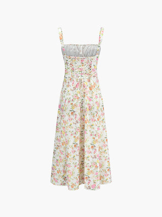 Robe longue plissée à motif floral avec nœud