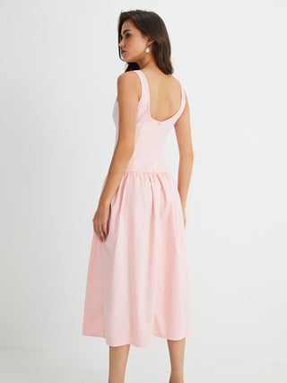 Robe midi plissée sans manches à boutons multiples