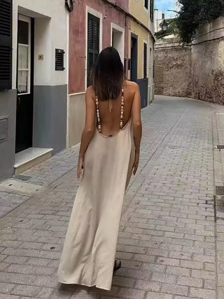 Robe dos nu à bretelles perlées