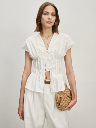 Blouse plissée en coton nouée