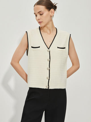 Gilet sans manches en tricot à boutons métalliques et bordure contrastée