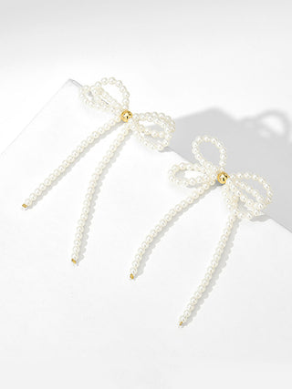 Boucles d'oreilles à pompon et perles