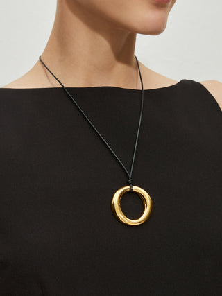 Collier pendentif rond doré