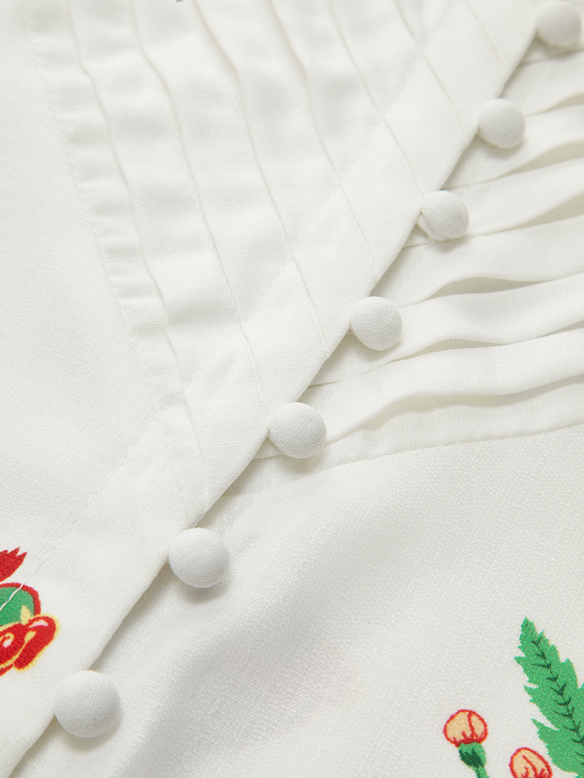 semble de shorts à boutons plissés imprimés